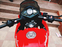 Red Bajaj Pulsar AS 150
