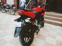 Red Bajaj Pulsar AS 150