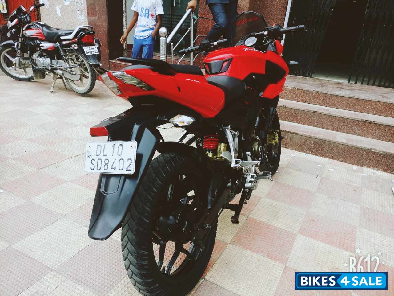 Red Bajaj Pulsar AS 150