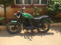 Green-white Royal Enfield Thunderbird