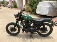 Green-white Royal Enfield Thunderbird