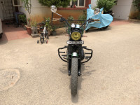 Green-white Royal Enfield Thunderbird