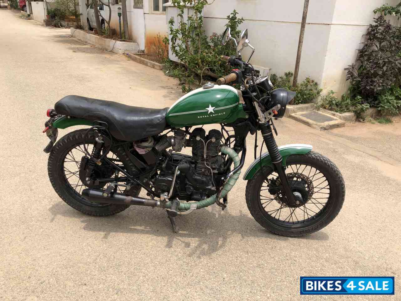 Green-white Royal Enfield Thunderbird