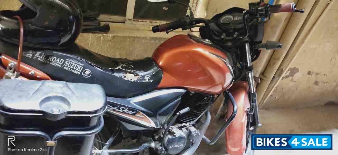 Orange Suzuki SlingShot Plus