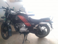 Black And Orange Bajaj V12