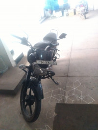 Black And Orange Bajaj V12