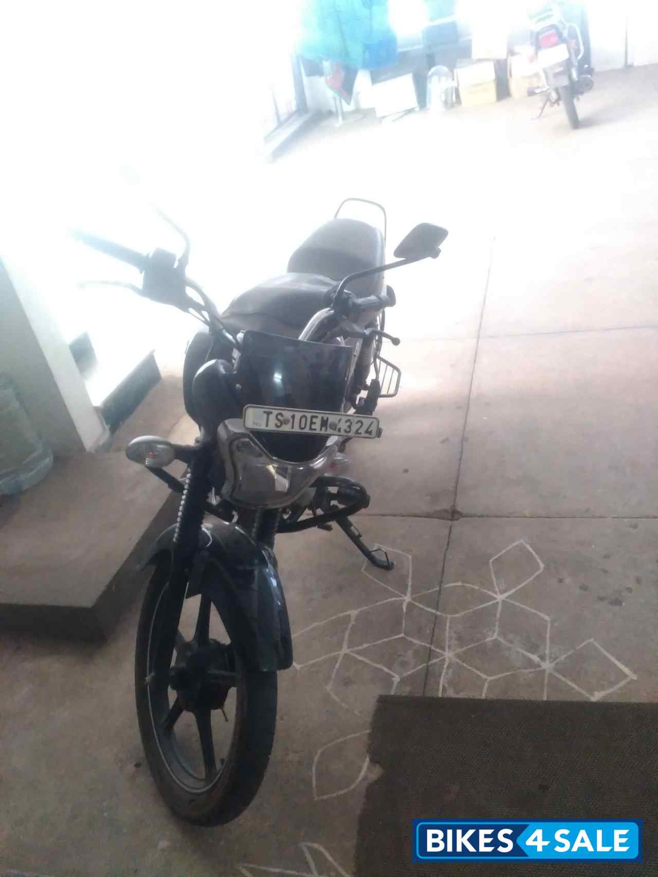 Black And Orange Bajaj V12