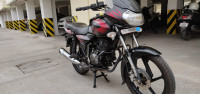 Black/red Bajaj Discover 125