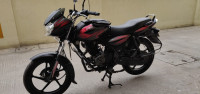Black/red Bajaj Discover 125