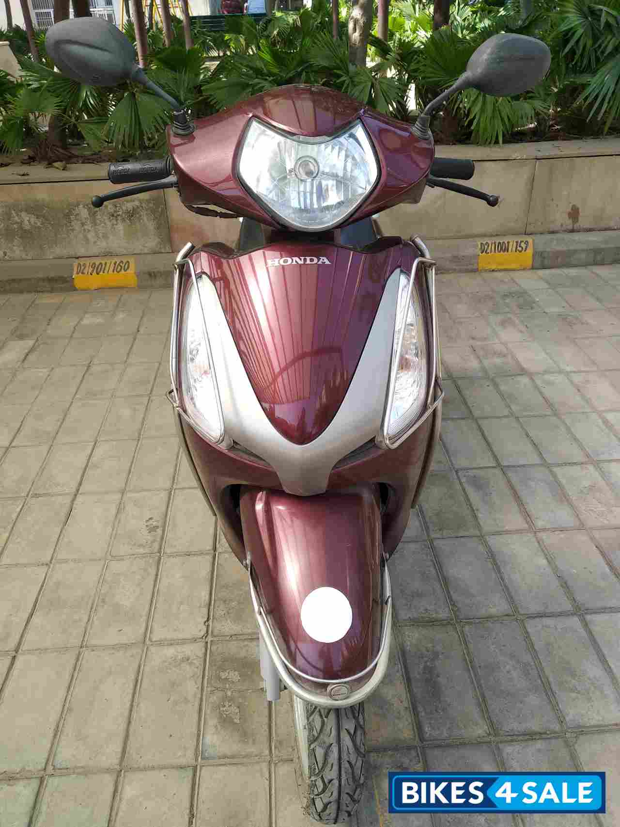 Maroon Honda Aviator