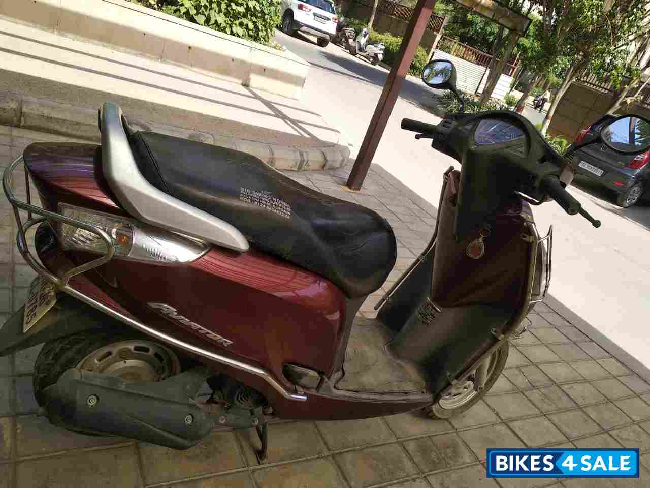 Maroon Honda Aviator
