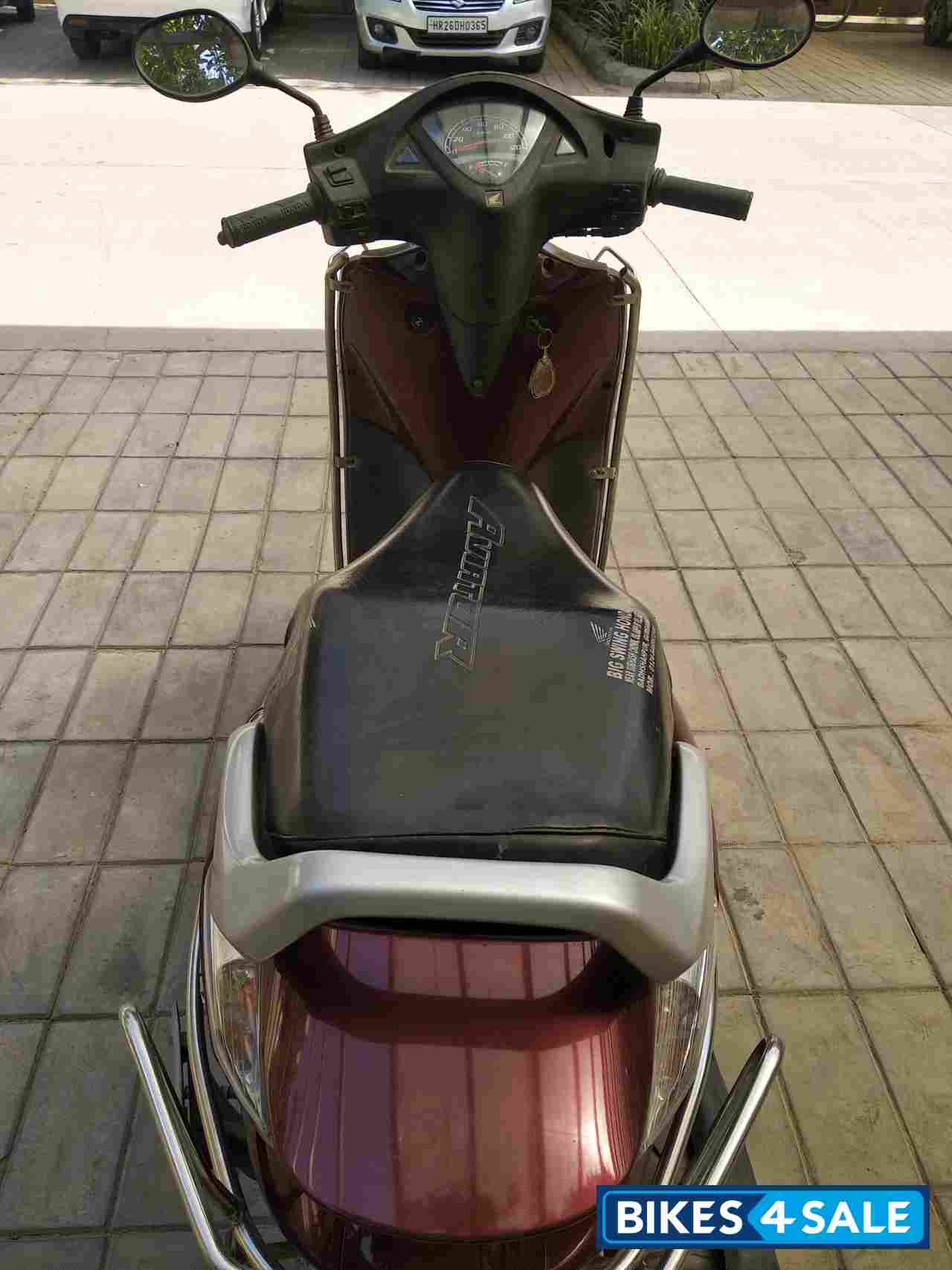 Maroon Honda Aviator