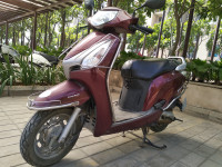 Maroon Honda Aviator