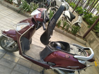 Maroon Honda Aviator