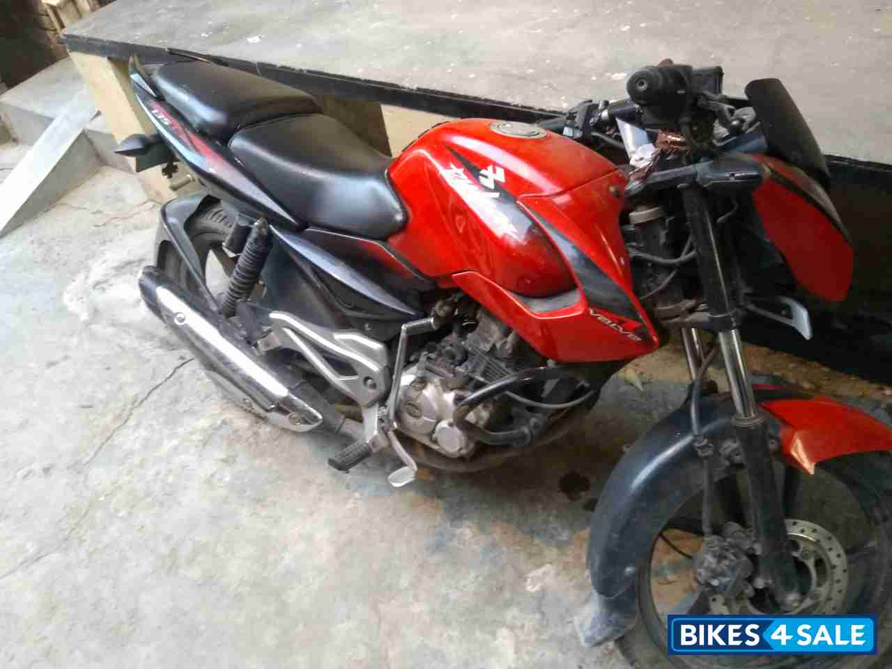 Red Bajaj Pulsar 135LS