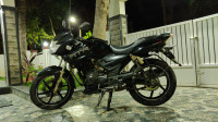 Black TVS Apache RTR 180