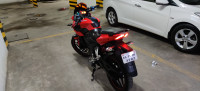 Red Bajaj Pulsar AS 150
