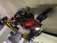 Red Bajaj Pulsar AS 150