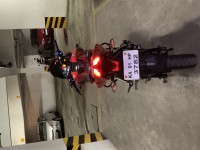 Red Bajaj Pulsar AS 150