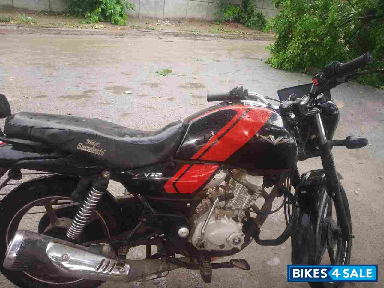 Orange, Black Bajaj V12