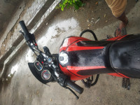 Orange, Black Bajaj V12