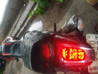 Orange, Black Bajaj V12