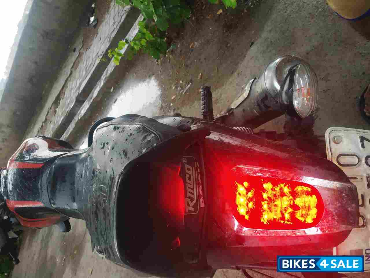 Orange, Black Bajaj V12