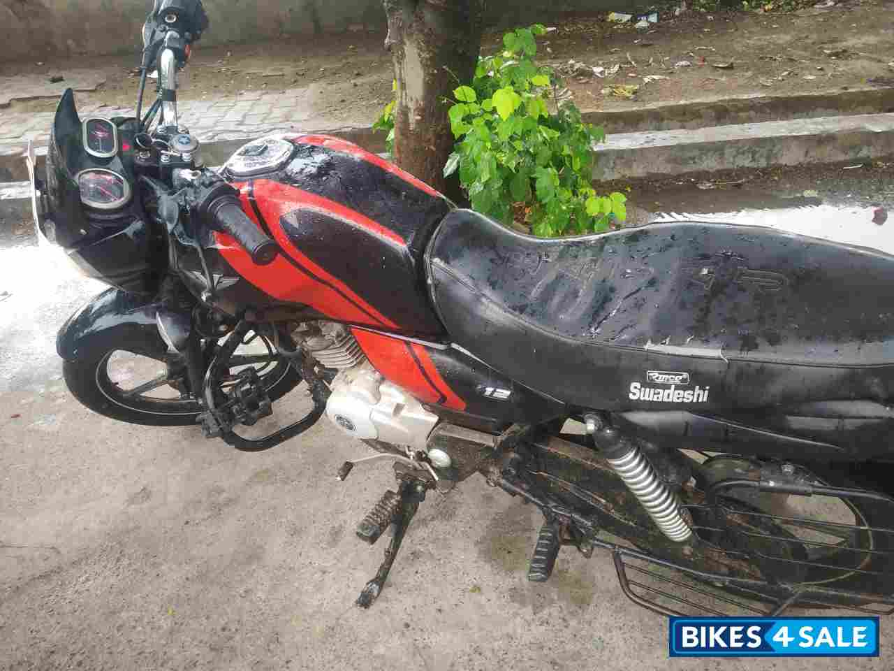 Orange, Black Bajaj V12