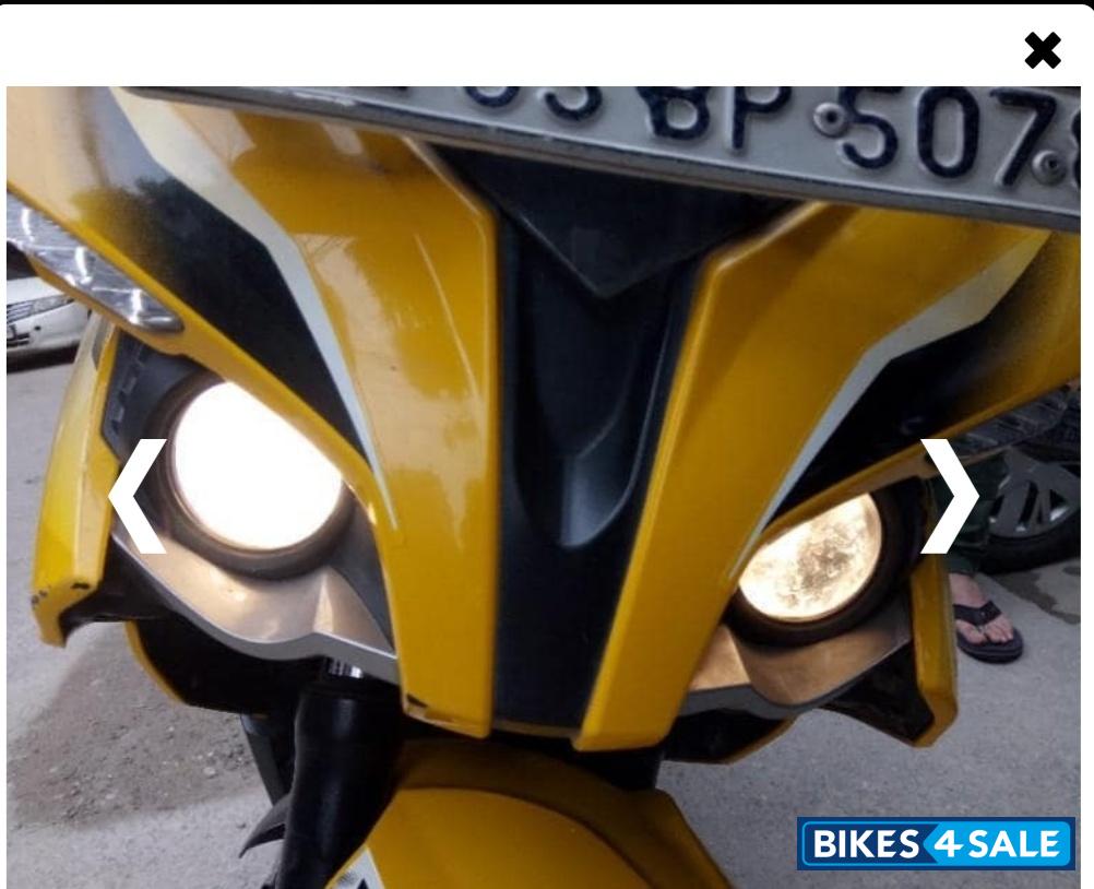 Yellow Bajaj Pulsar RS 200 ABS
