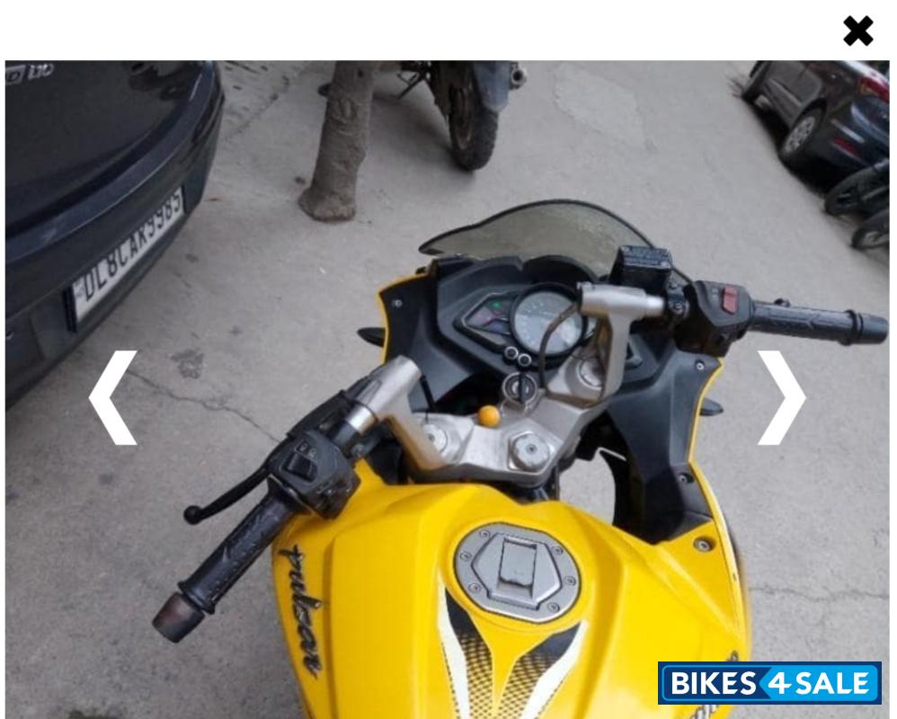 Yellow Bajaj Pulsar RS 200 ABS