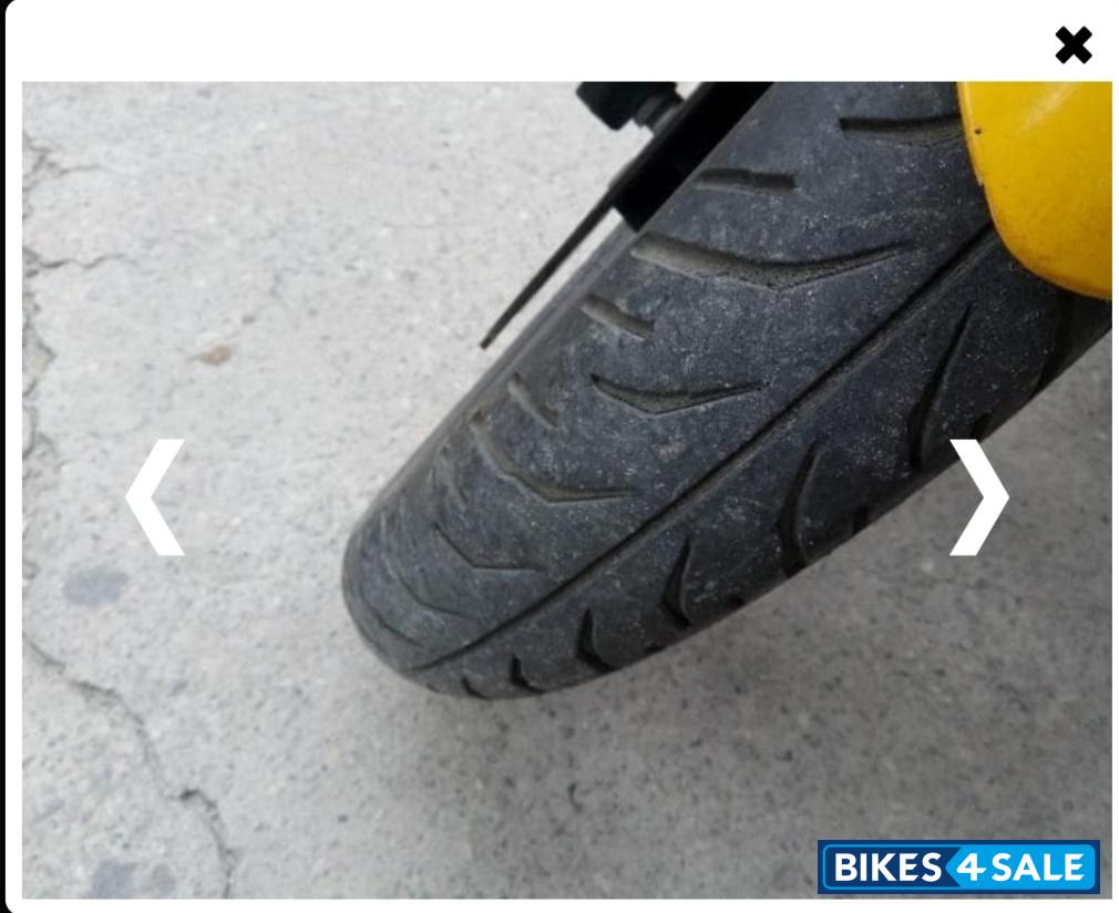 Yellow Bajaj Pulsar RS 200 ABS