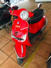 Glassy Red Vespa LX 125