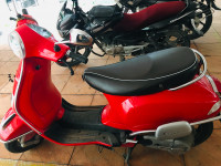 Glassy Red Vespa LX 125