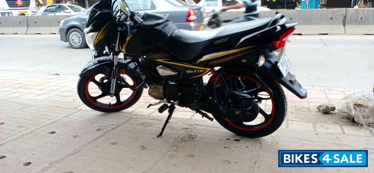 Yellow TVS Victor Premium Edition