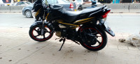 Yellow TVS Victor Premium Edition