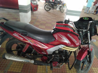Red Mahindra Centuro