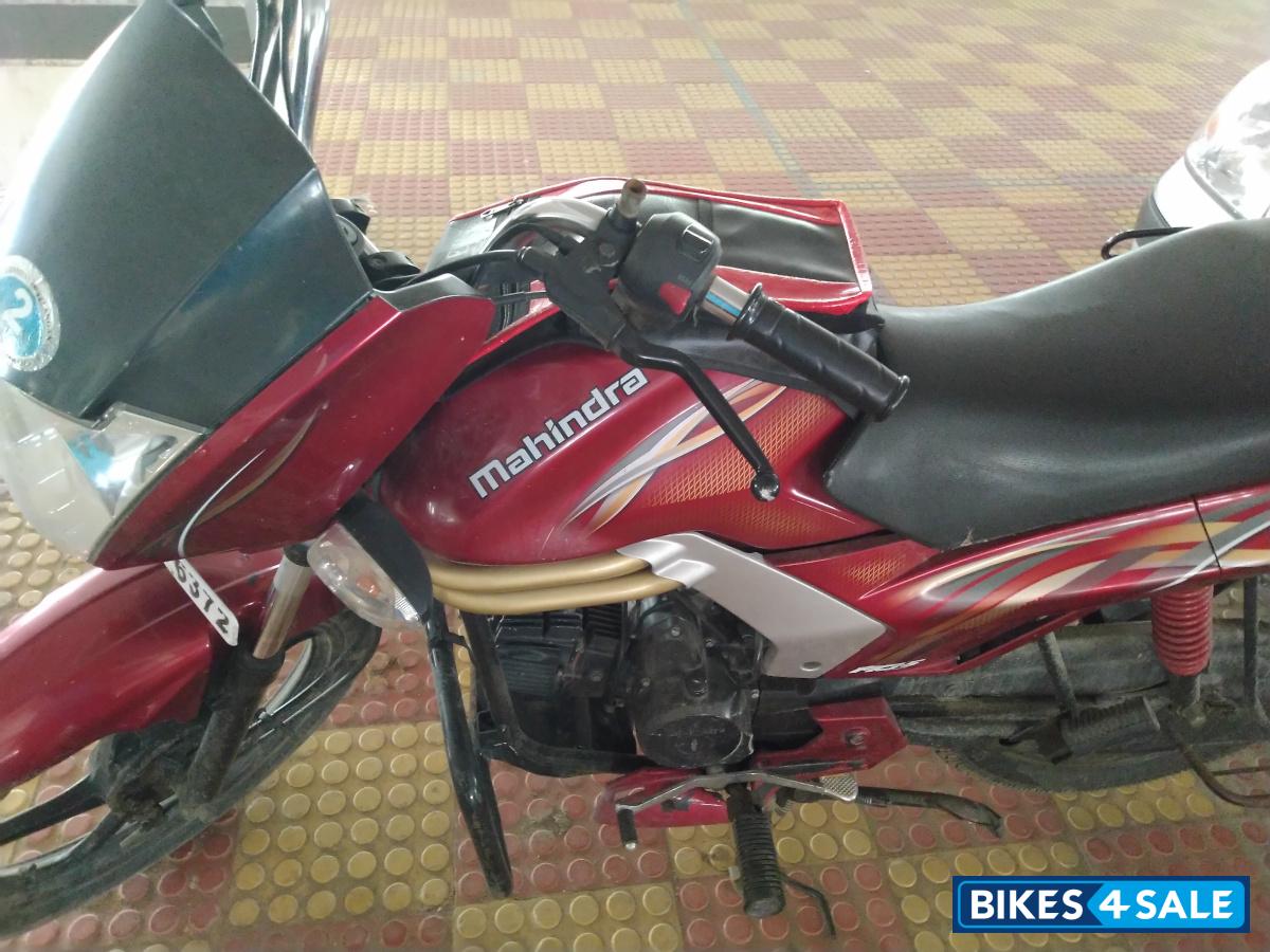 Red Mahindra Centuro