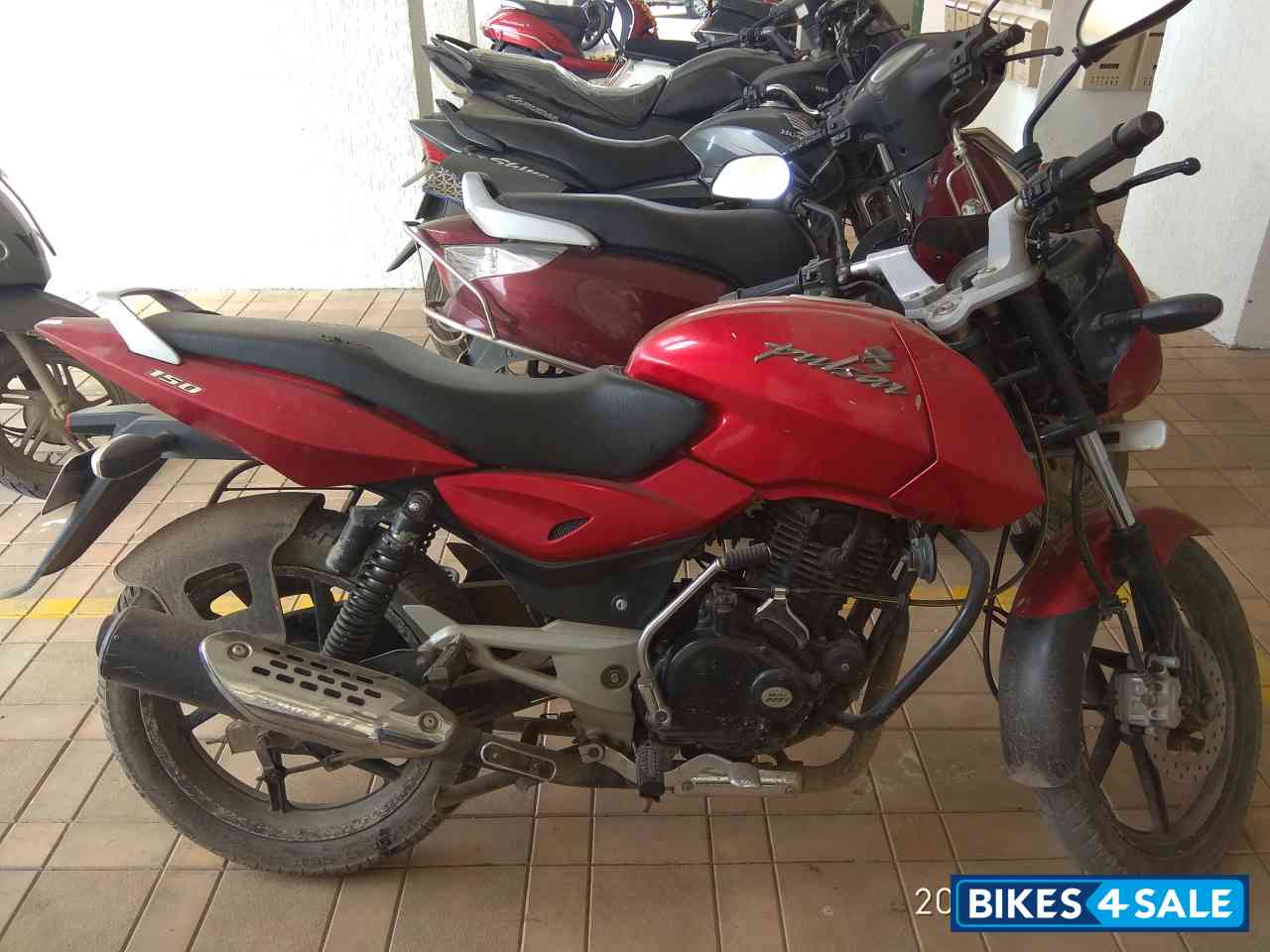 Red Bajaj Pulsar 150 DTSi
