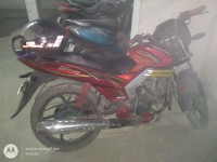 Red Mahindra Centuro