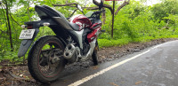Maroon Suzuki Gixxer SF