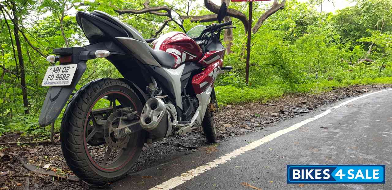 Maroon Suzuki Gixxer SF