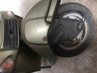 Bottle Green Bajaj Bravo