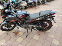 Black And Red Bajaj Pulsar 220 DTSFi