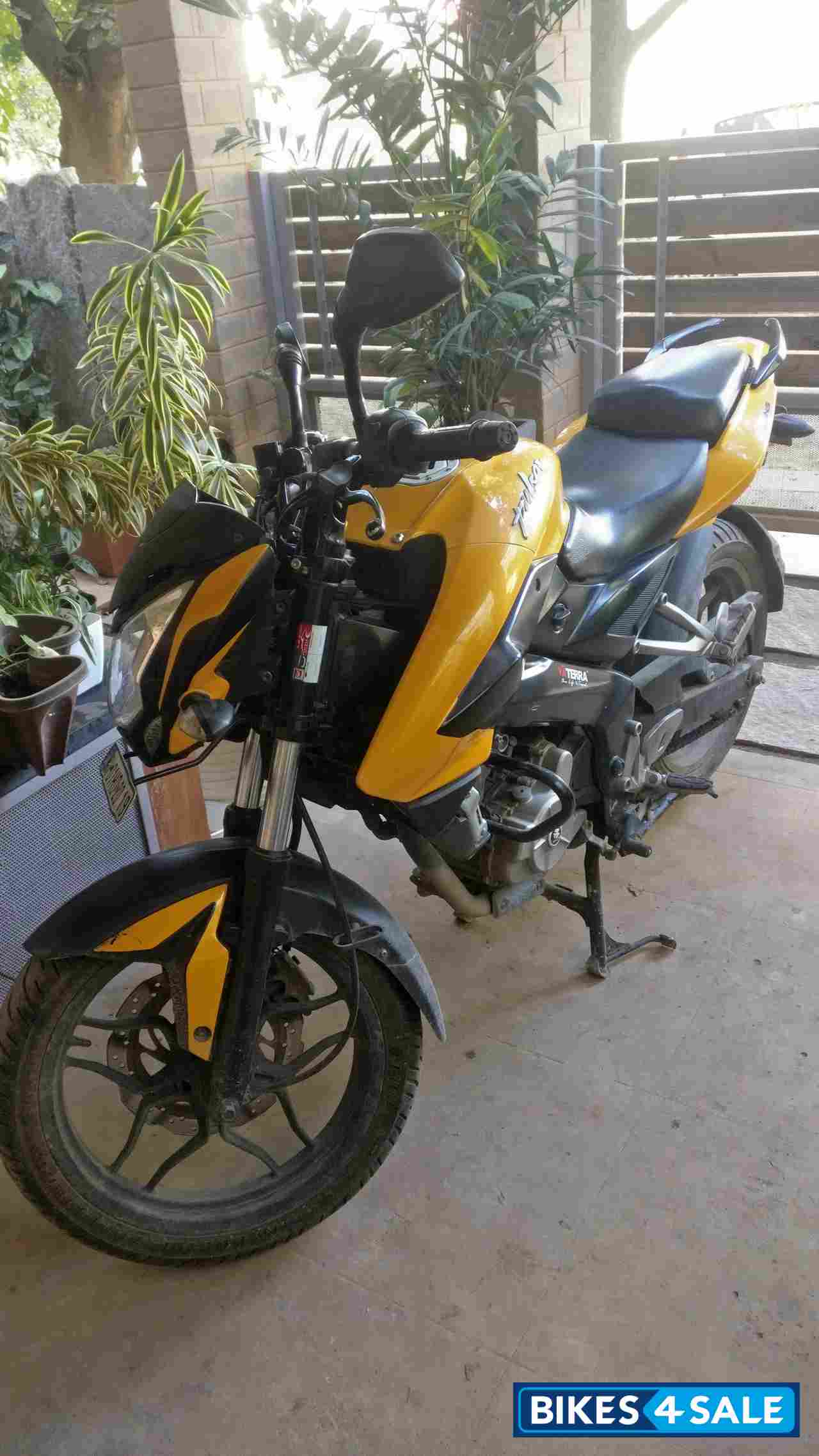 Yellow Bajaj Pulsar 200 NS