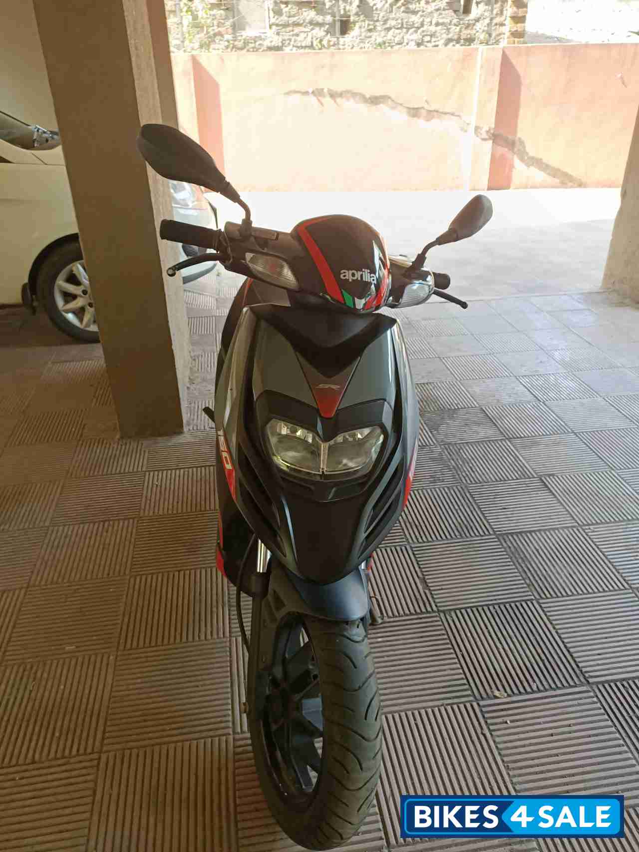 Black Aprilia SR 150