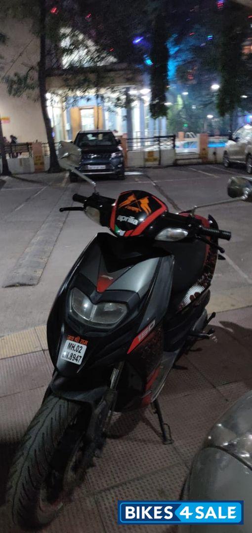 Black Aprilia SR 150