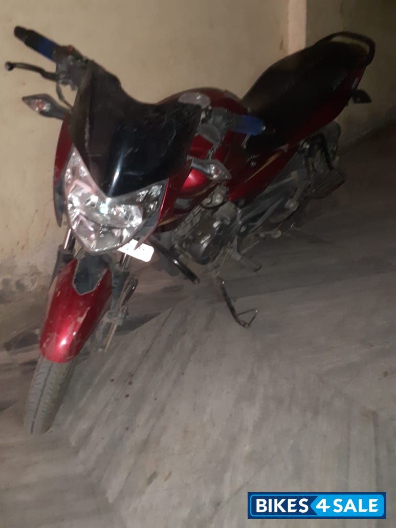 Red Bajaj Pulsar 135LS
