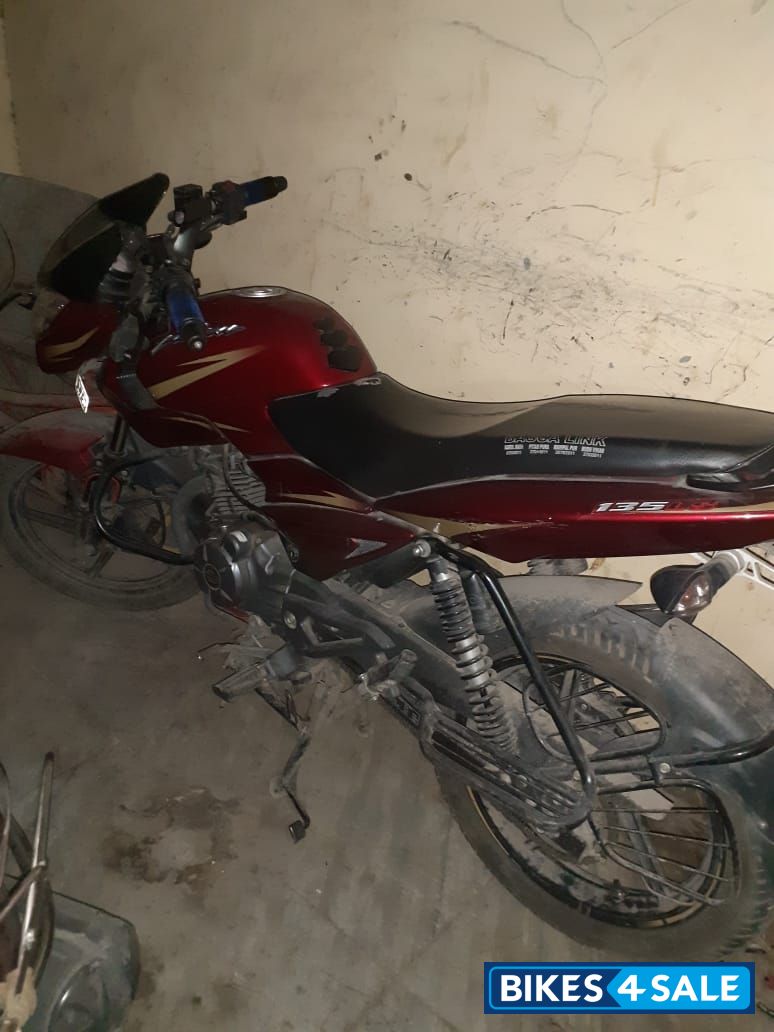 Red Bajaj Pulsar 135LS