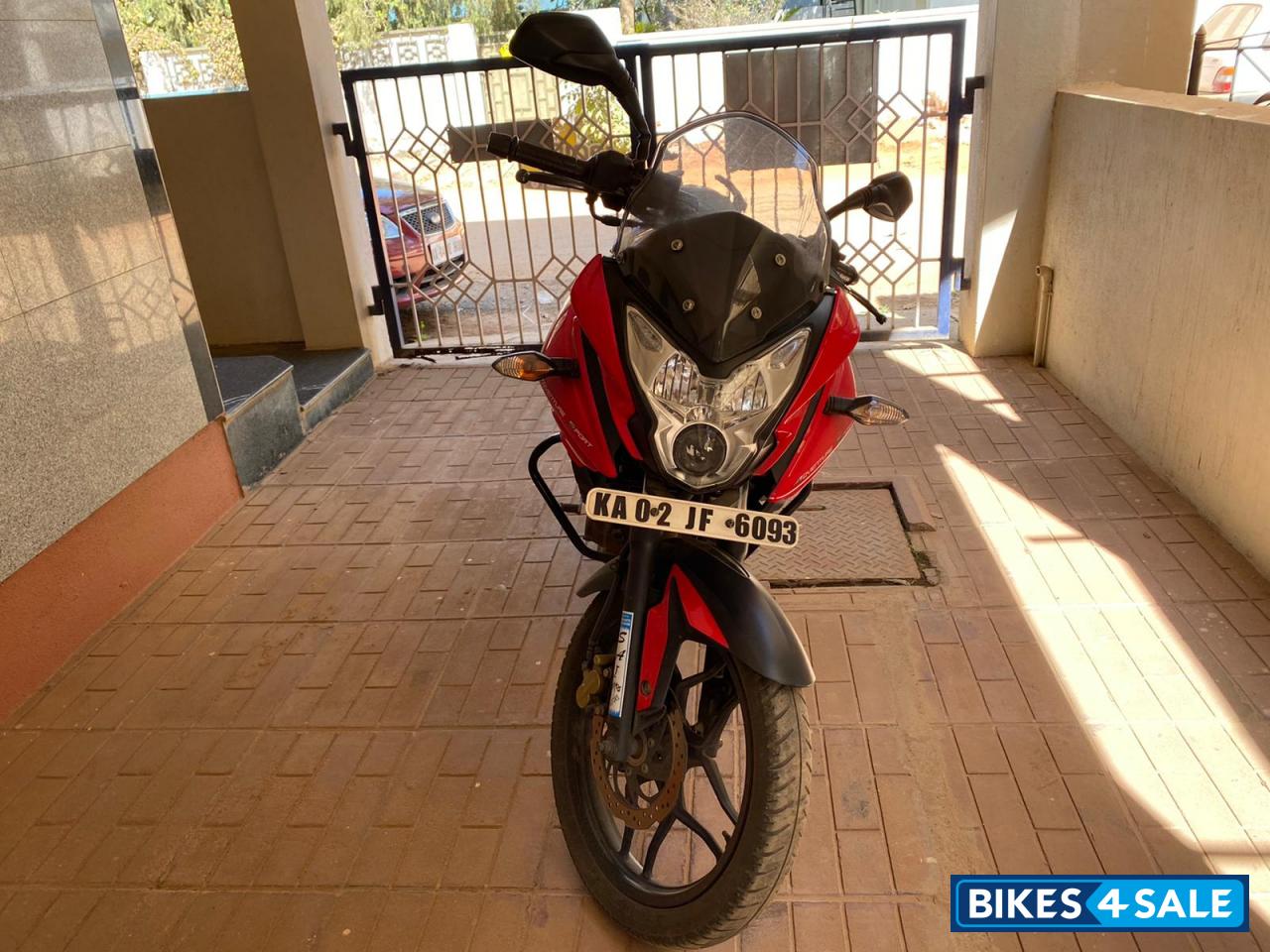 Red Bajaj Pulsar AS 150
