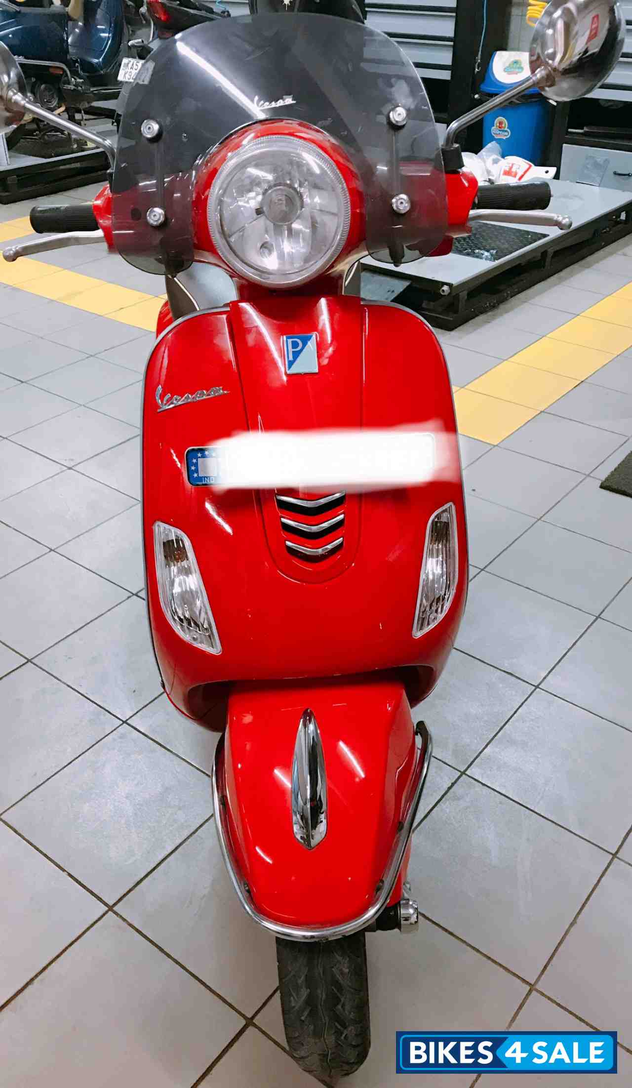 Red Vespa VXL 150
